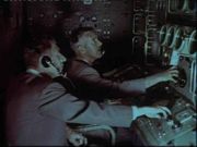 Muchea VERLORT operators at work. Don Blackman (foreground) transferred to the Carnarvon Tracking Station:Still photo taken from a NASA film