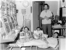 Noted trencher-man and transmitter technician George Allan has his on-duty meal delivered to FPQ-6. Serving him (left to right) are Frank Vinton, Colin Forbes, Nola Meiklejohn, and Geoff Goddard. Photo - George Allan